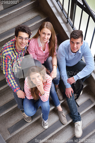 Image of happy teens group in school