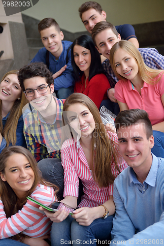 Image of happy teens group in school