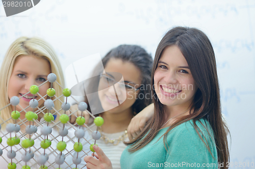 Image of happy teens group in school