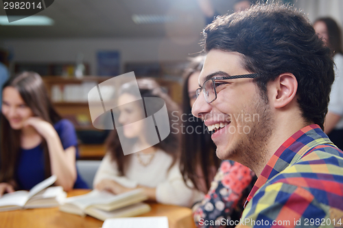 Image of happy teens group in school