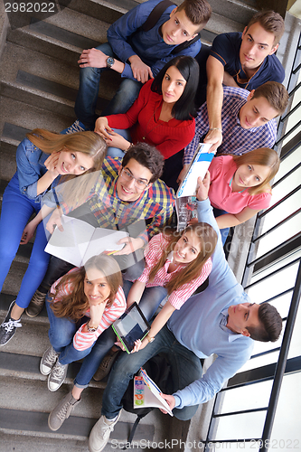 Image of happy teens group in school