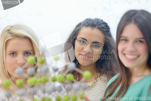 Image of happy teens group in school