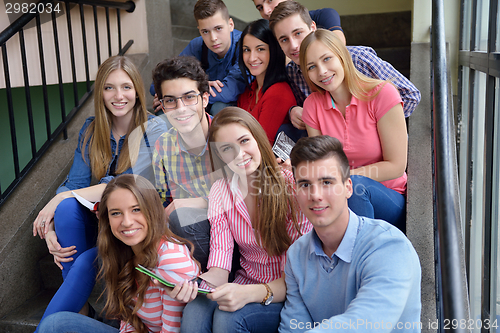 Image of happy teens group in school