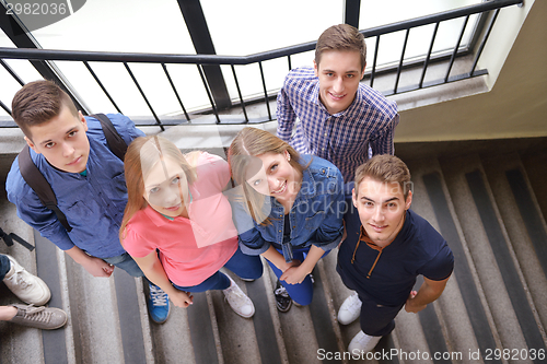 Image of happy teens group in school