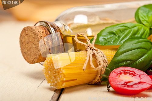 Image of Italian spaghetti pasta tomato and basil