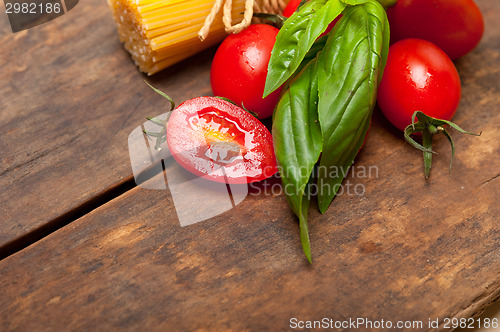 Image of Italian spaghetti pasta tomato and basil