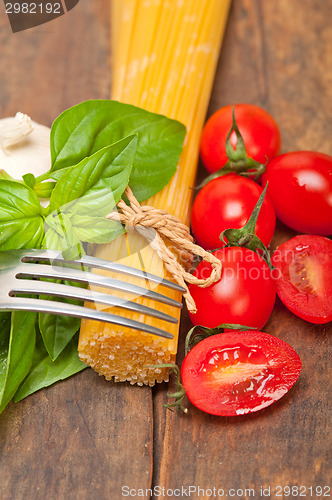 Image of Italian spaghetti pasta tomato and basil