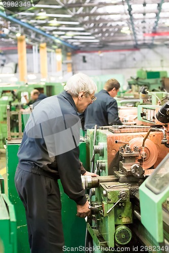 Image of Milling-machine operator works at  machine