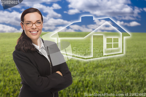 Image of Woman and Grass Field with Ghosted House Figure Behind