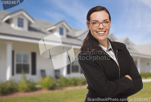 Image of Mixed Race Woman in Front of Residential House