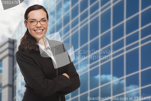 Image of Confident Attractive Mixed Race Woman in Front of Corporate Buil
