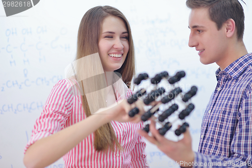 Image of happy teens group in school