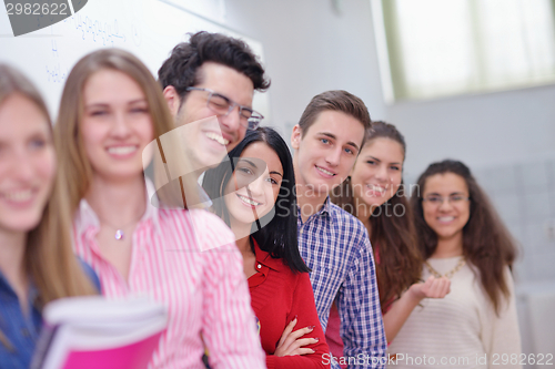 Image of happy teens group in school