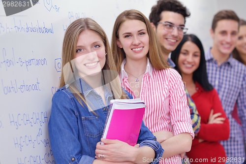 Image of happy teens group in school