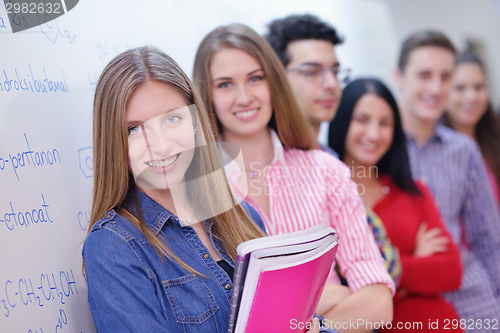 Image of happy teens group in school