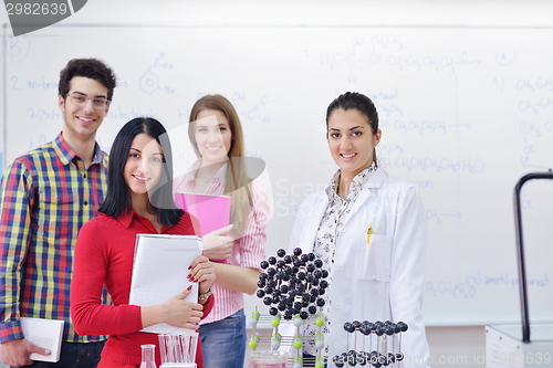 Image of happy teens group in school