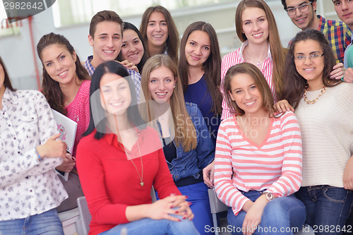 Image of happy teens group in school