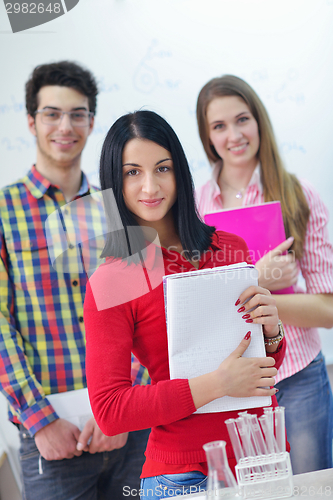 Image of happy teens group in school