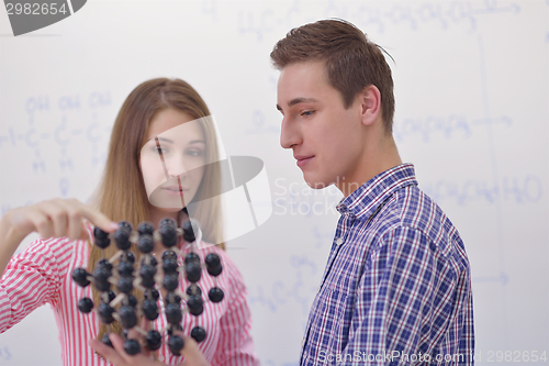 Image of happy teens group in school