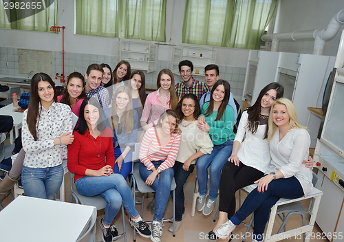 Image of happy teens group in school