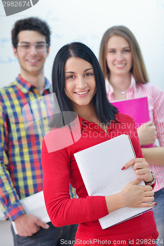 Image of happy teens group in school