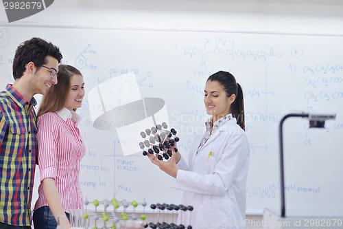 Image of happy teens group in school