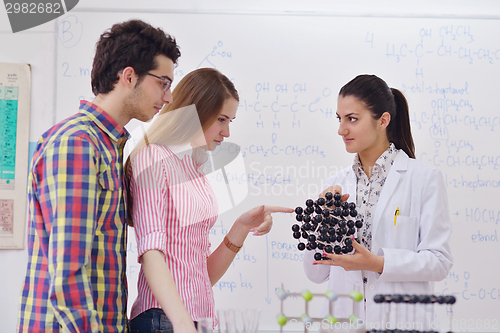 Image of happy teens group in school