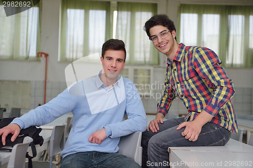 Image of happy teens group in school