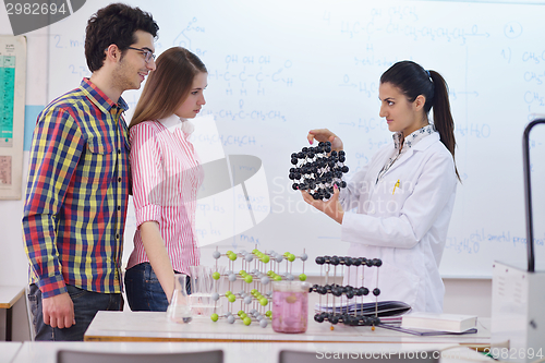 Image of happy teens group in school