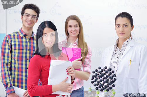 Image of happy teens group in school