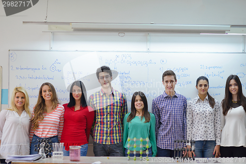 Image of happy teens group in school