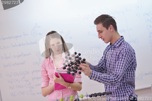 Image of happy teens group in school