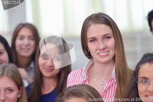 Image of happy teens group in school