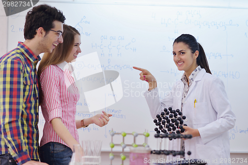 Image of happy teens group in school