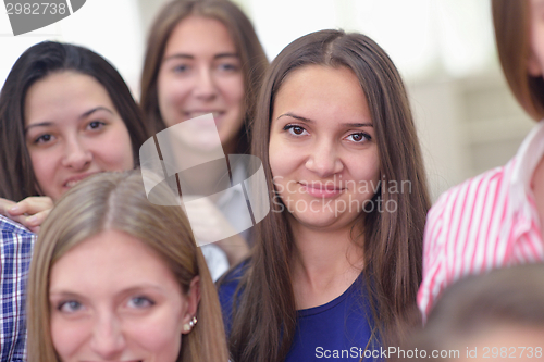 Image of happy teens group in school