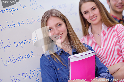 Image of happy teens group in school