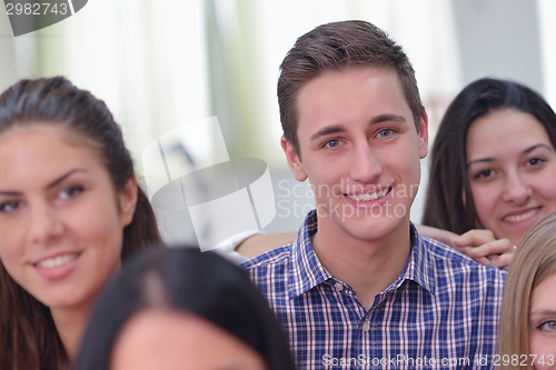 Image of happy teens group in school