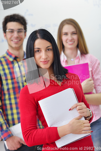 Image of happy teens group in school