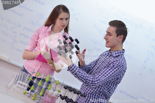 Image of happy teens group in school