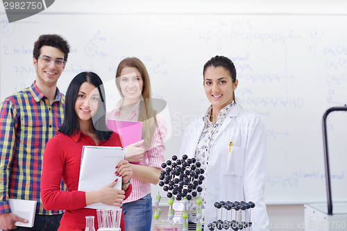 Image of happy teens group in school