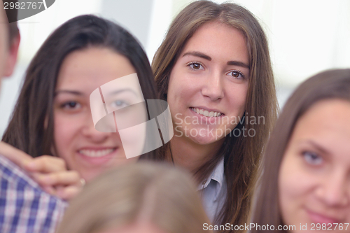 Image of happy teens group in school