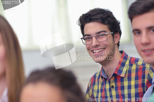 Image of happy teens group in school