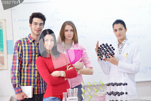 Image of happy teens group in school