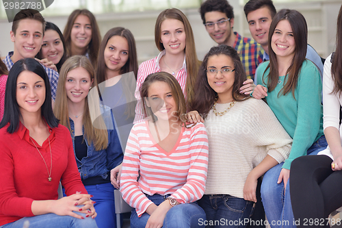 Image of happy teens group in school