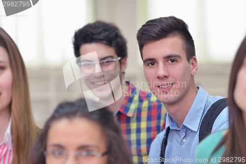 Image of happy teens group in school