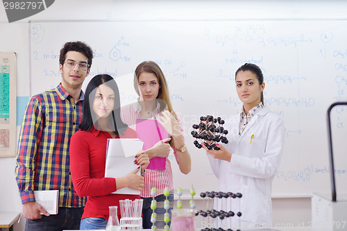 Image of happy teens group in school