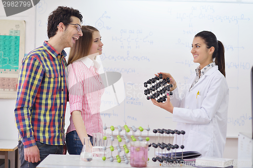 Image of happy teens group in school