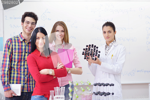 Image of happy teens group in school