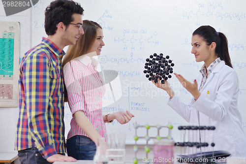 Image of happy teens group in school