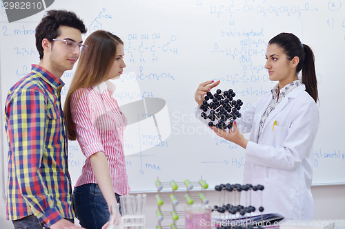 Image of happy teens group in school